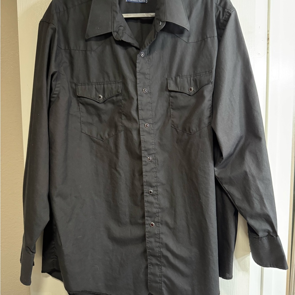 Black Wrangler long sleeve shirt.